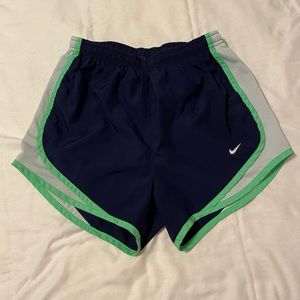 Navy and neon green Nike tempo shorts
